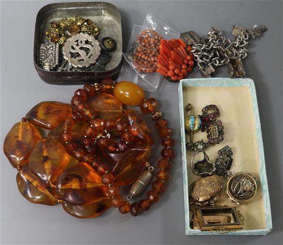 Two yellow metal rings including 9ct, two yellow metal lockets including 9ct and other jewellery including coral, silver and amber.